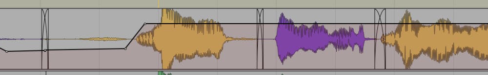A DAW screenshot showing two overlapping vocal waveforms with automation envelopes, depicting breath reduction using automated volume adjustments between phrases.
